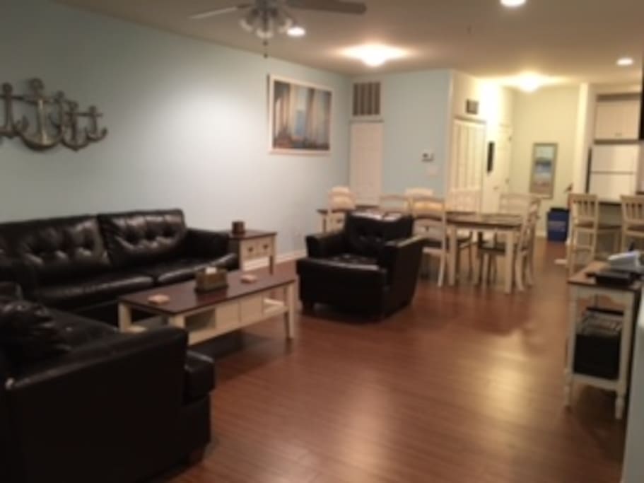 2ND FLOOR: SPACIOUS LIVING AREA, FLAT SCREEN TV, LARGE BALCONY, 1/2 BATH, DINING AREA, KITCHEN