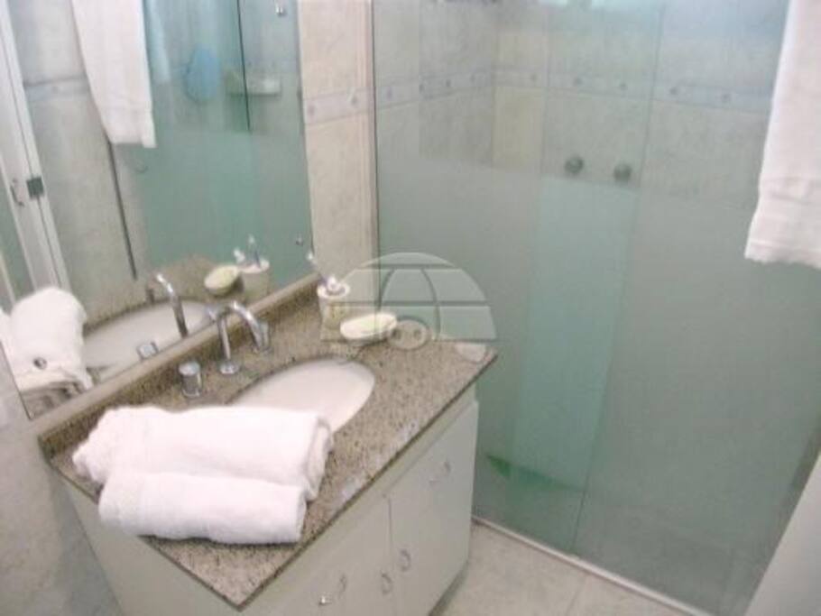 Shared large bathroom, with shower.