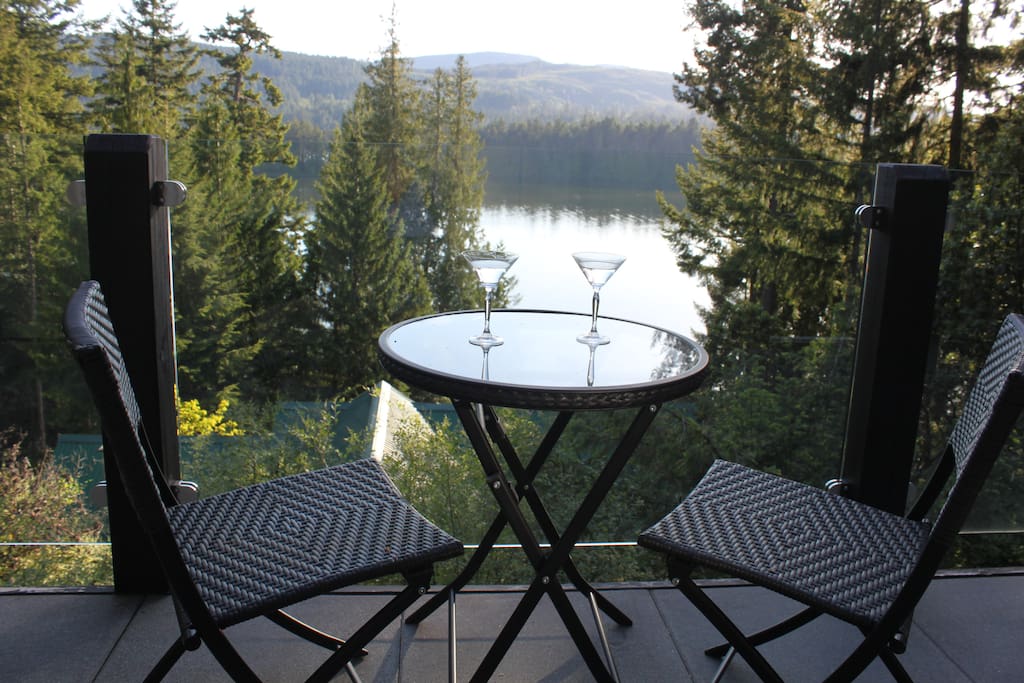 Enjoy a treetop westward view of Shawnigan Lake from a full size deck, finishing your day with peaceful quiet.