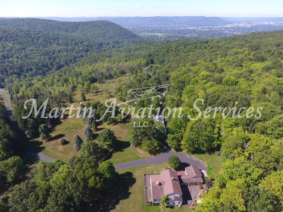Aerial view showing extent of property