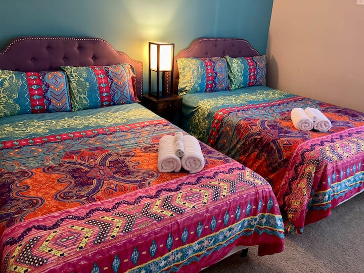 Upstairs - two full beds in this colorful room