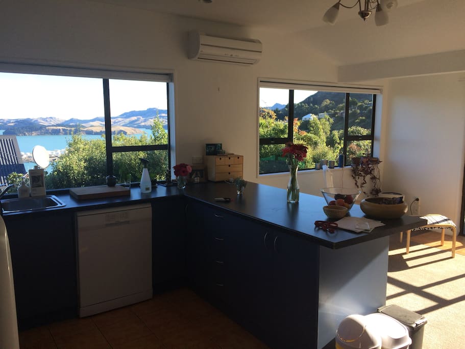 Kitchen/dining room with amazing views of the Lyttelton basin.