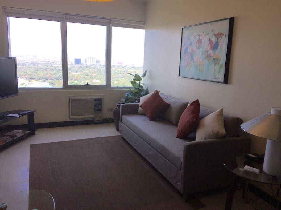 Upon entering the condominium unit a sweeping panorama of the Manila golf course welcomes you.