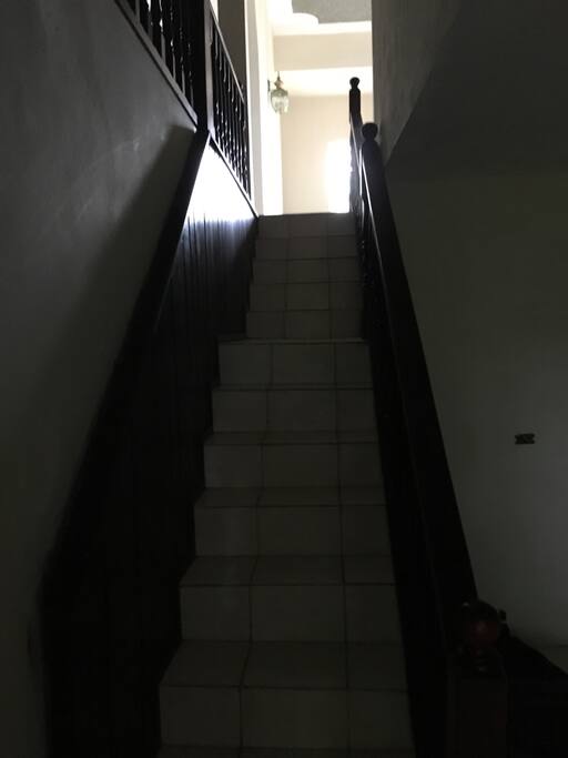 Staircase from kitchen to living room