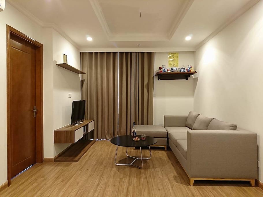 Large living room, free space to practice Yoga in the morning if you want, big LCD Tivi 65 inch perfect for watching football or playing games.