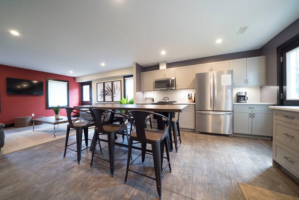 The kitchen has all of the amenities you need- fridge, stove, dishwasher, microwave.
