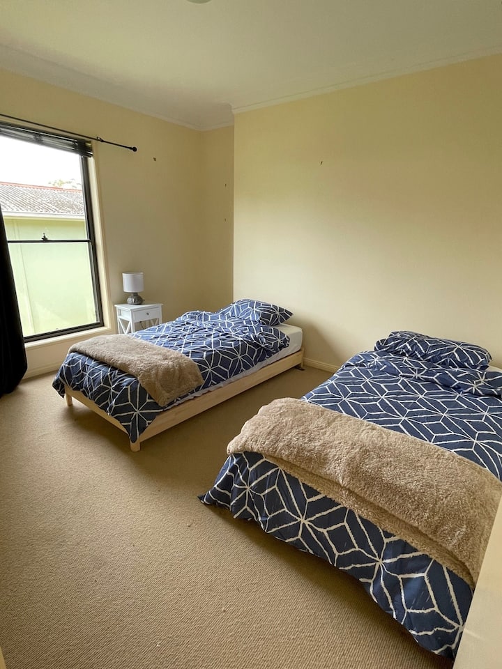 Third bedroom with BIR and two single beds