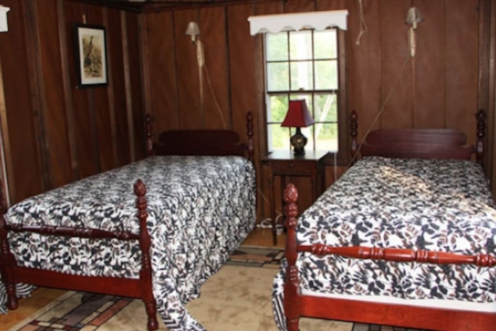 Twin beds at the Cottage.