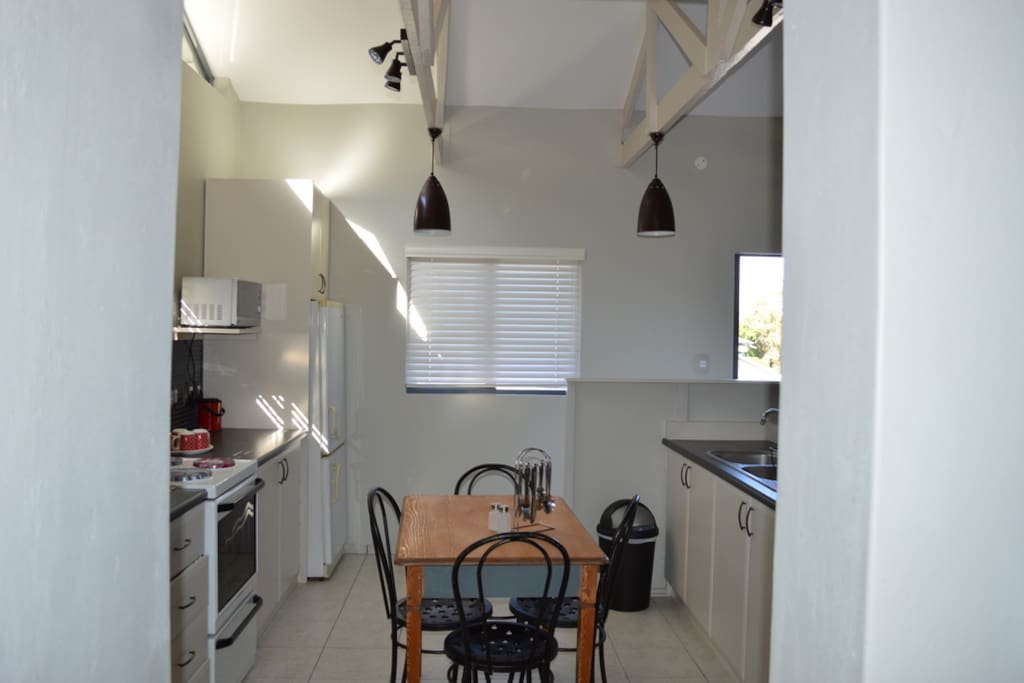 Fully equipped kitchen and small dining table