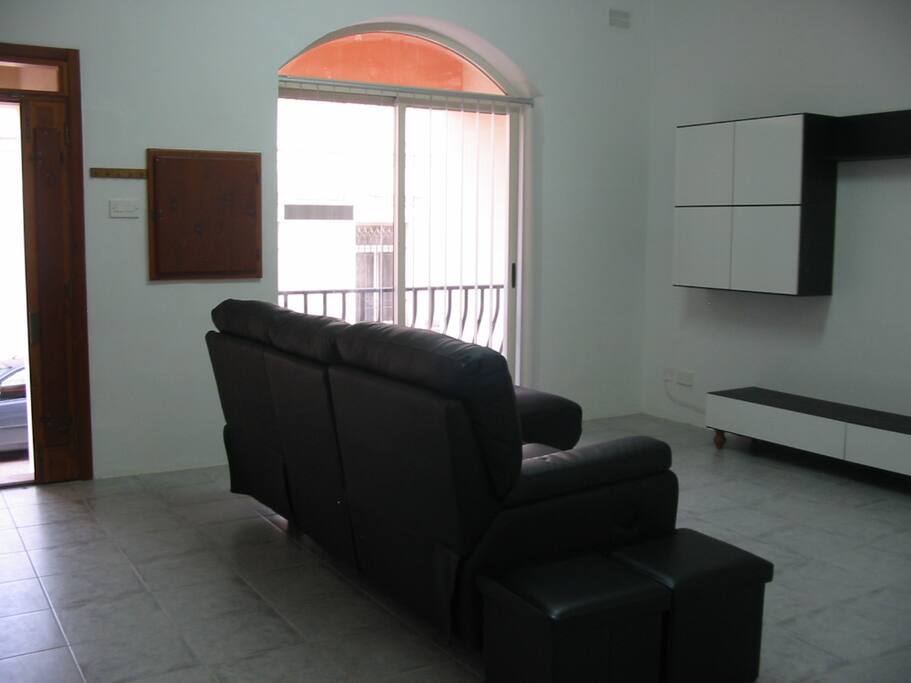 Main front door leads directly into living room.