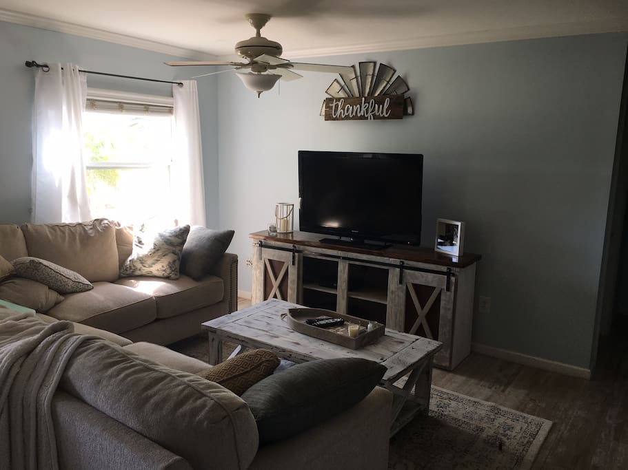 Living room area. Cable and DVD player provided.