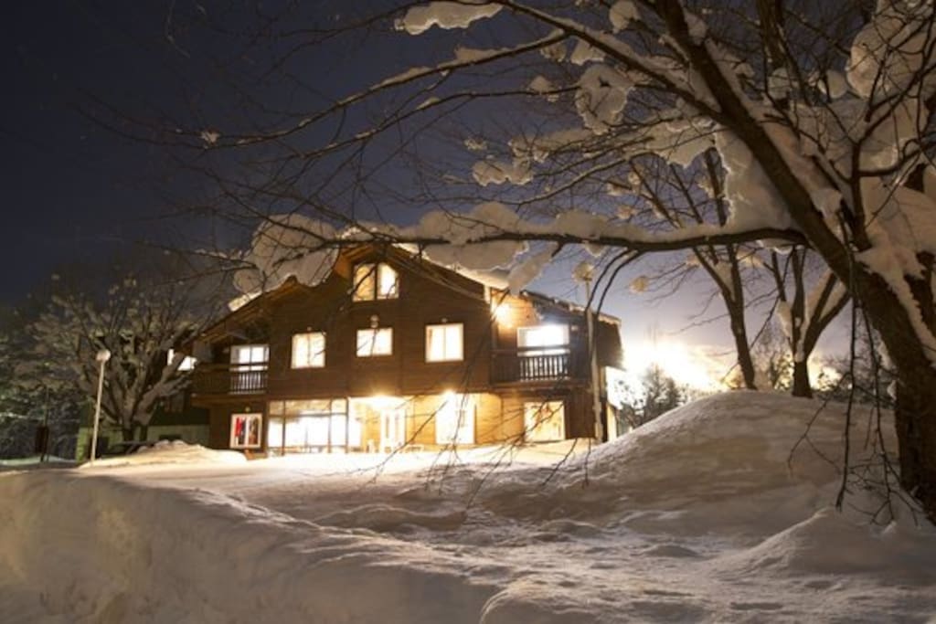 North Point with the glow of Hirafu night skiing