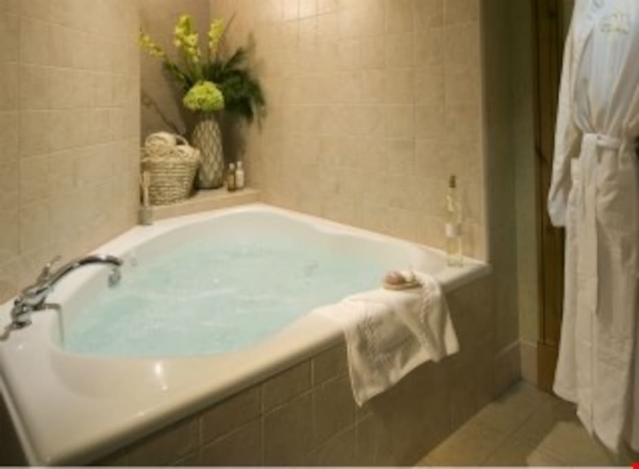 Soak sore muscles in the luxurious soaker tub.