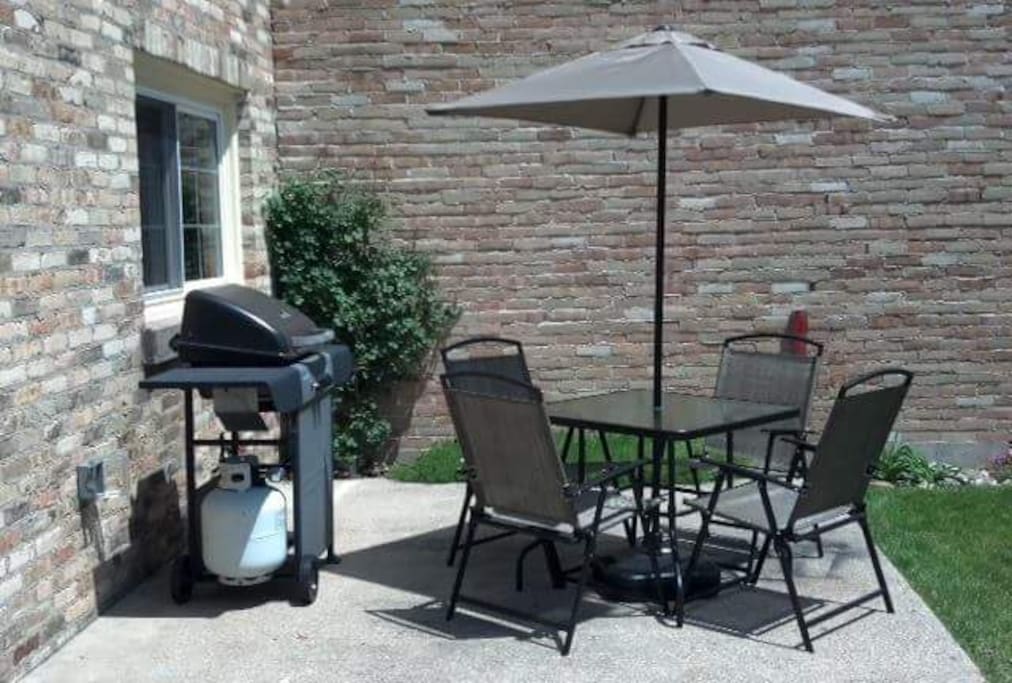 Outdoor patio with BBQ just off kitchen