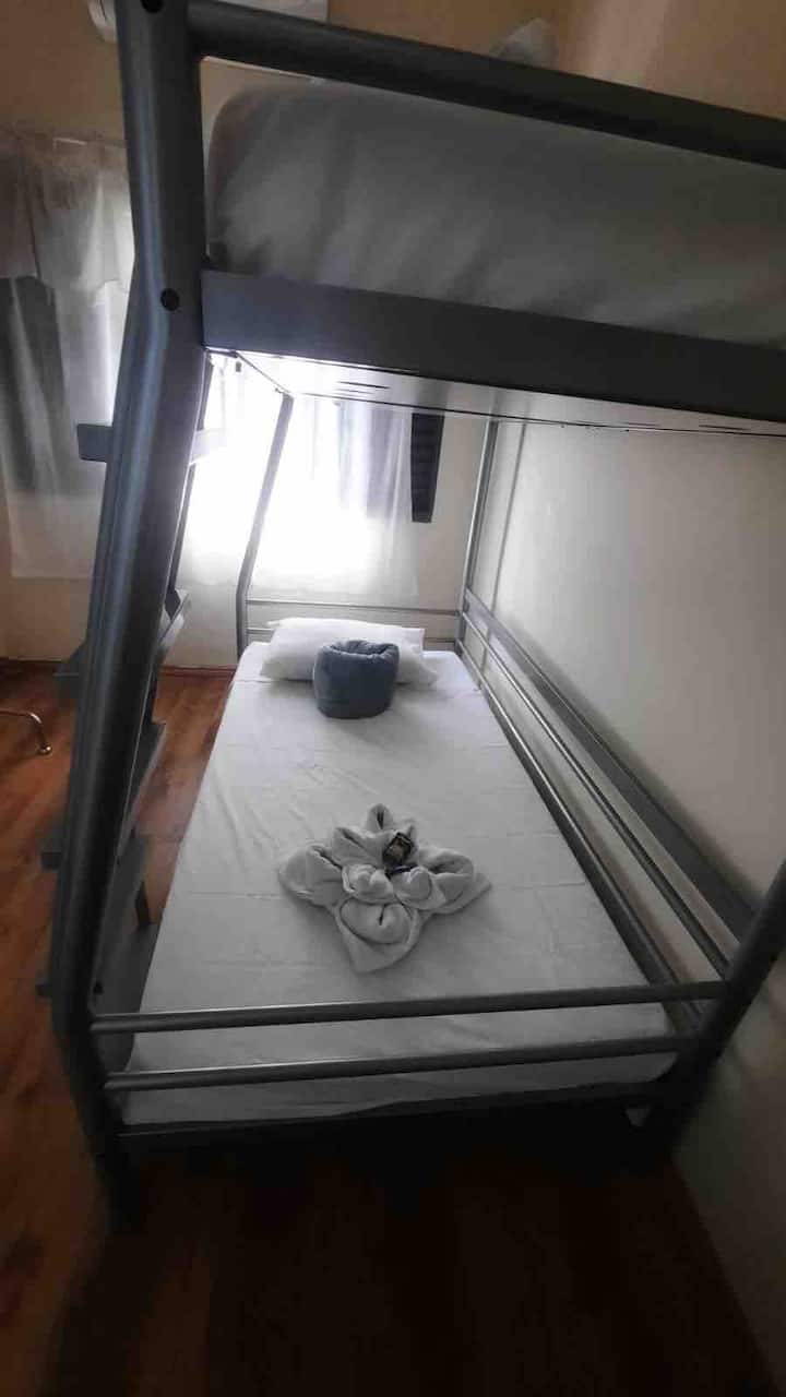Habitación compartida con litera 