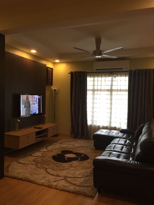 Living hall with built-in tv console + Sharp 42" tv + Lorenzo L-shape leather sofa
