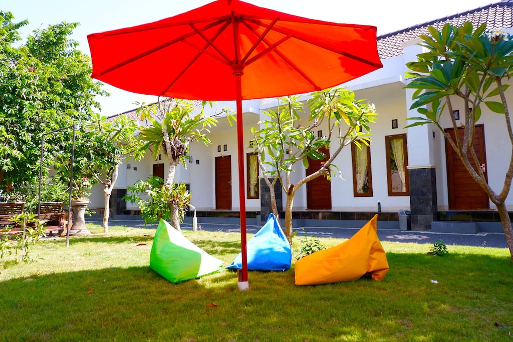 Big Green Garden With Bean bag and Sun Umbrella