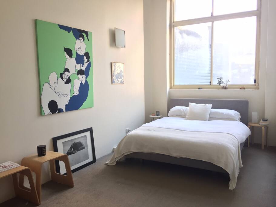 Spacious bedroom with high ceilings