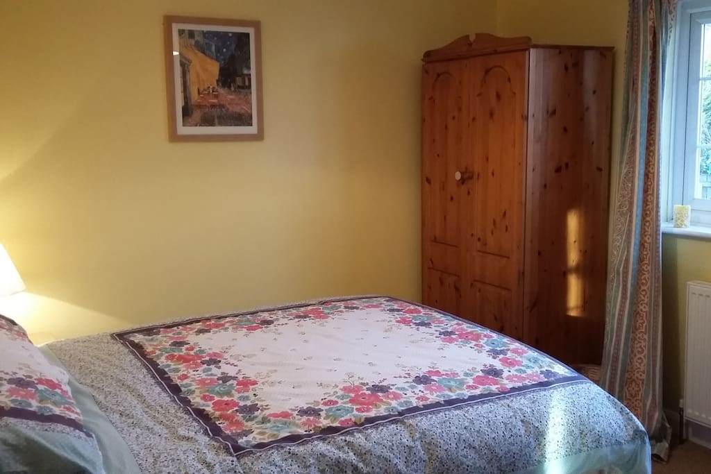 Comfy double bed with wardrobe