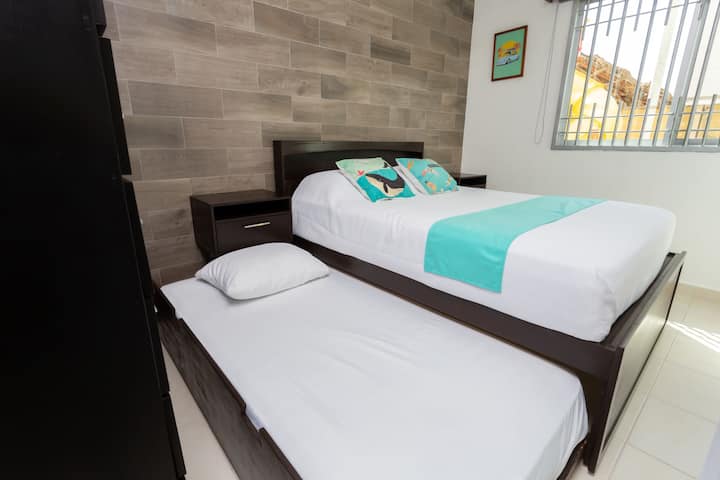 Queen and single bed in the second bedroom