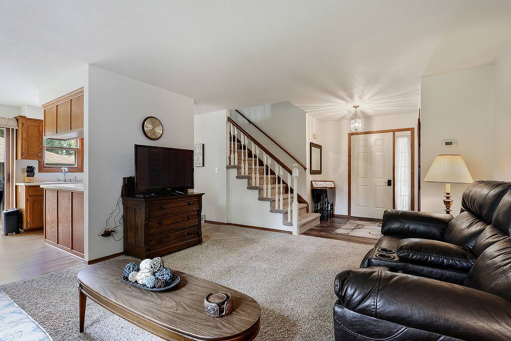 Open view from Living room to upstairs and kitchen area.