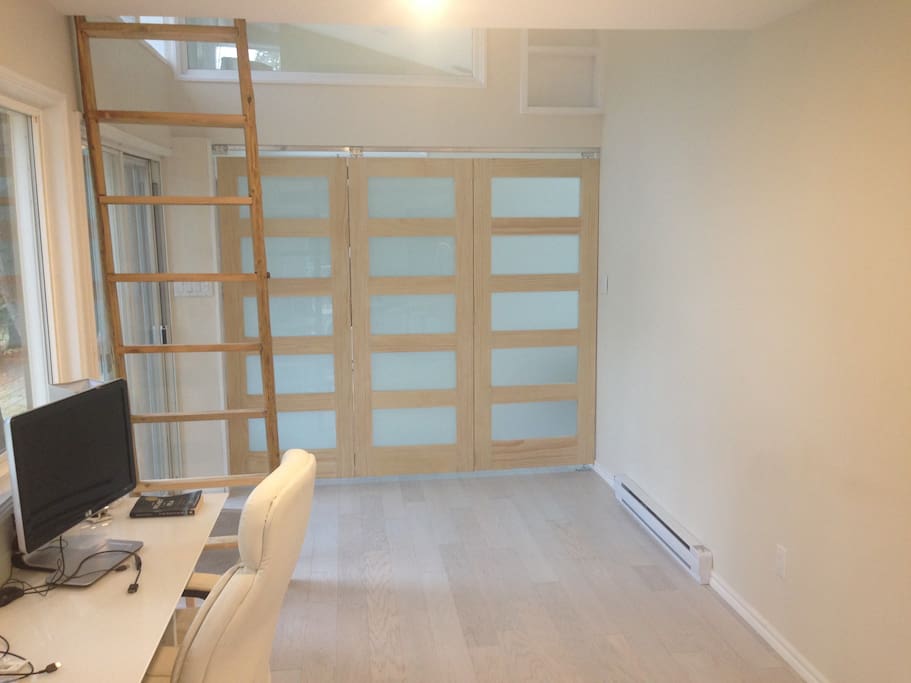 Office looking towards master bedroom (doors closed on bedroom)