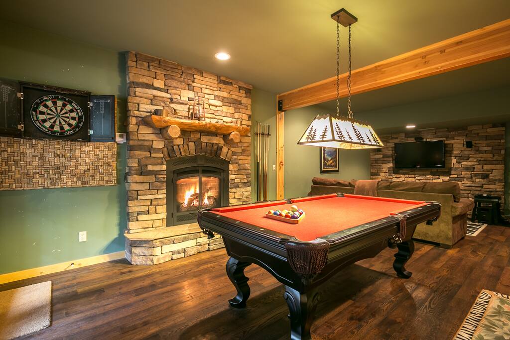 Play pool or darts by the gas fireplace
