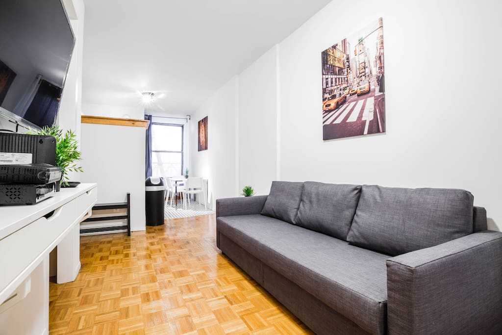 Main Living Room facing to the Kitchen with a queen size sofa/bed