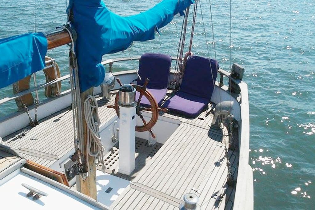 A spacious cockpit perfect for sunbathing after a swim, picnicing, entertaining guests, and cuddling.. relax and lay out on these beautiful teak decks~
