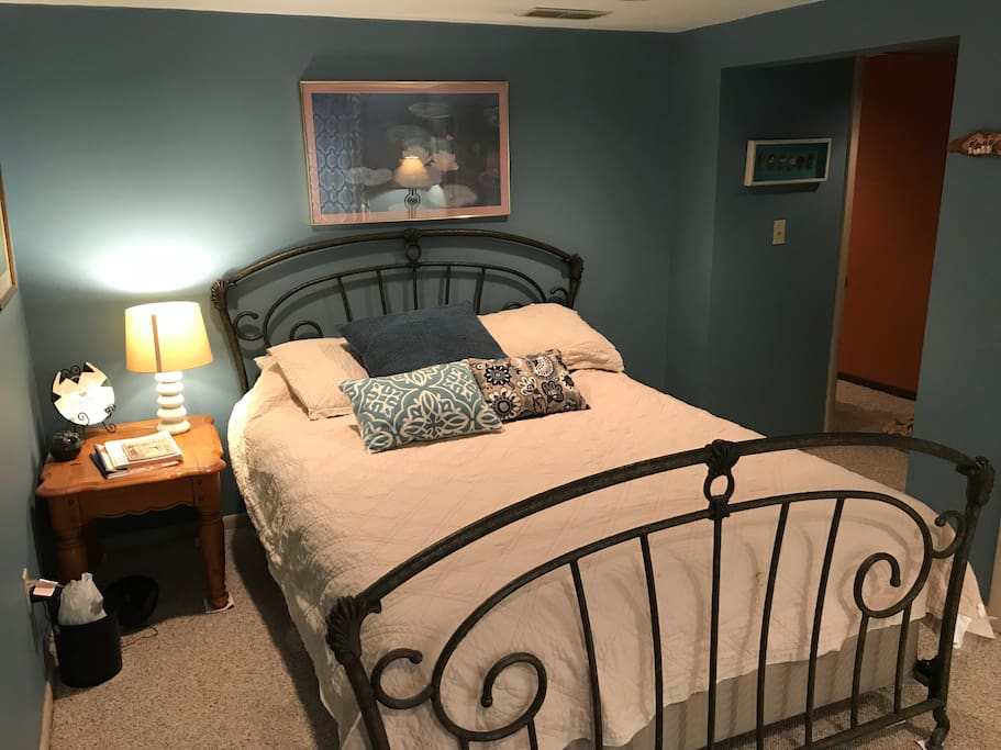 Comfortable cozy second bedroom .