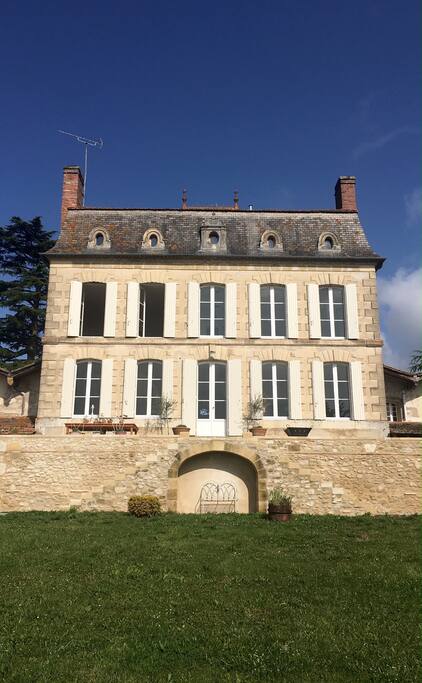Rear of the house with steps up to the terrace