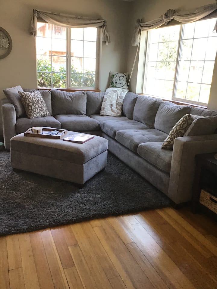 Cozy new sectional sofa for lounging in the living room after a long day of adventures 