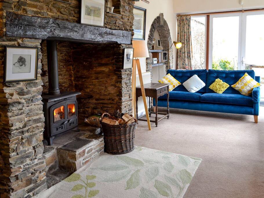 Large sitting room with the double patio doors at the end