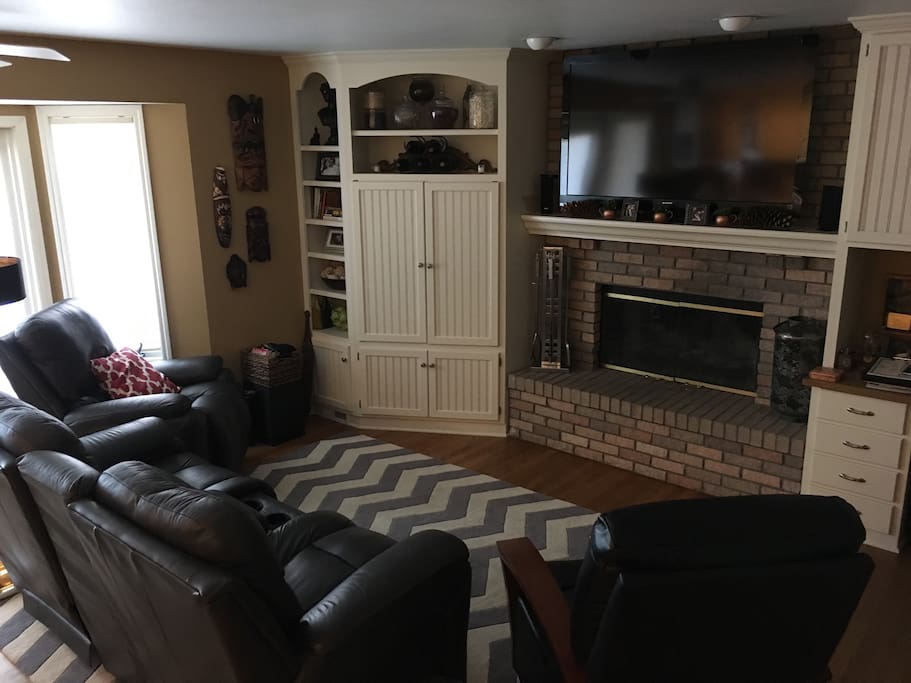 Family room adjacent to kitchen with attached deck