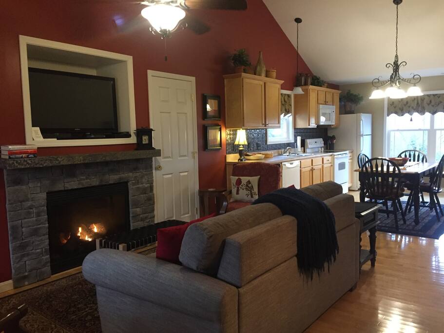 Living room with flat screen and fireplace