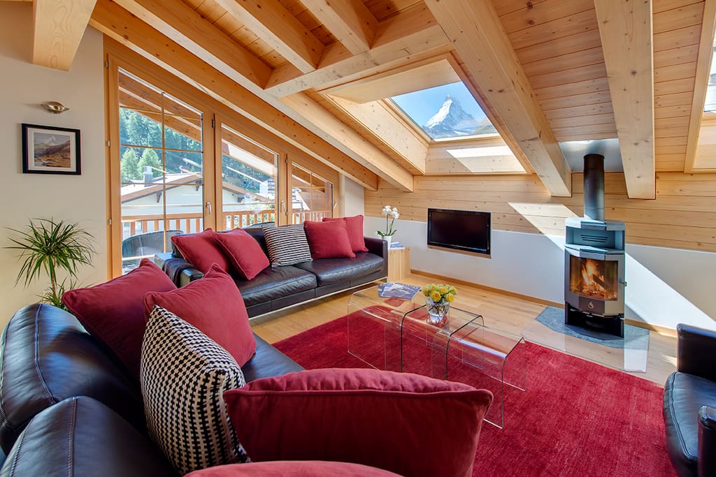 Wood burning fire and Matterhorn view through skylight