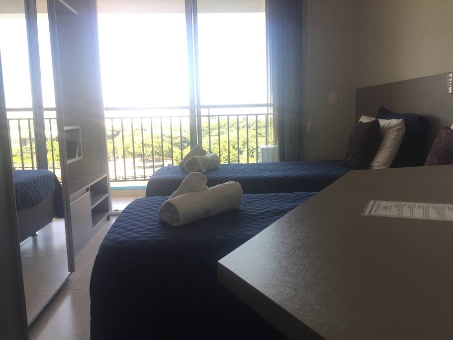 Quarto com vista para o Shopping Center Norte