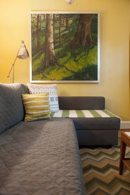 The sofa converts to a full-size bed.