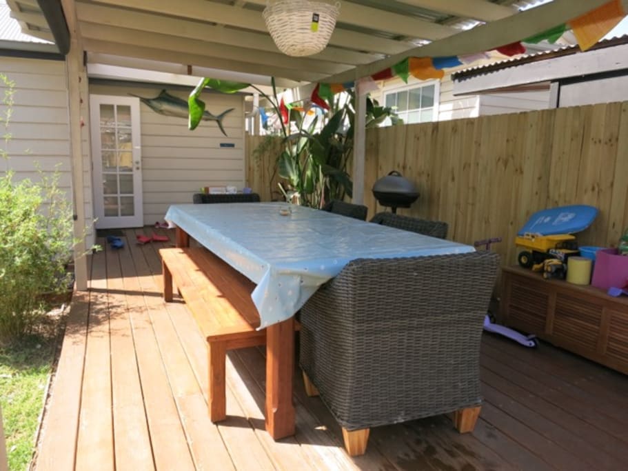 Large covered outdoor dining, perfect for summer BBQs