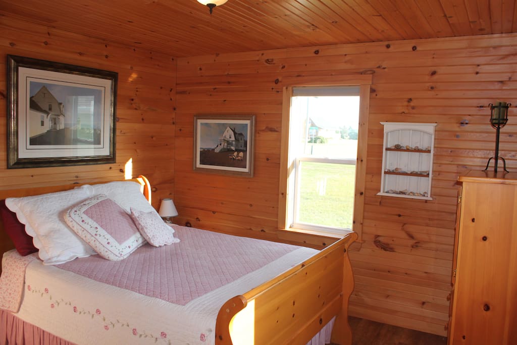 Master - Queen Sleigh Bed, Flat Screen TV, Vanity, and large closet.