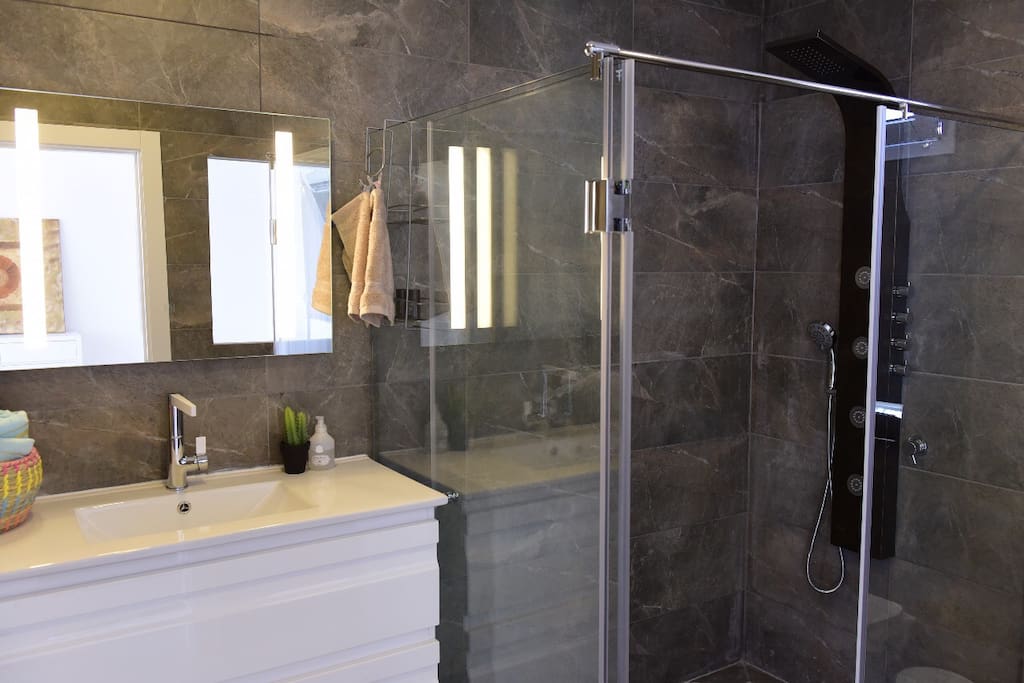 New&large bathroom with the latest jet shower, digital mirror, and other surprises...