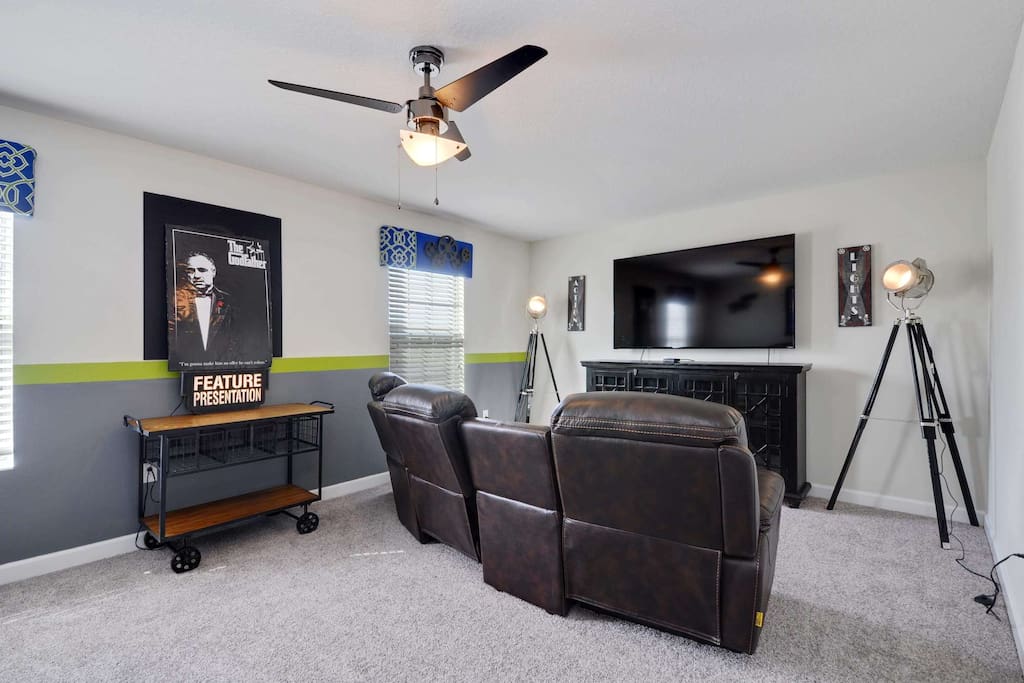 Another wonderful bonus space offered in this spacious home is this unique movie room.