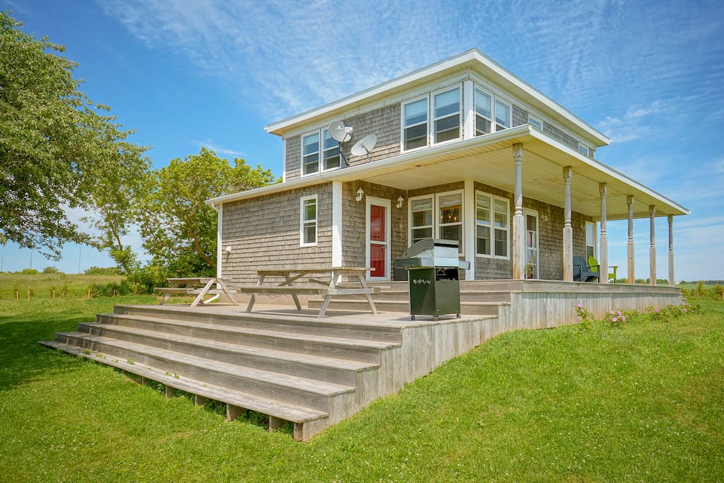 Enjoy our spacious farmhouse and the large deck