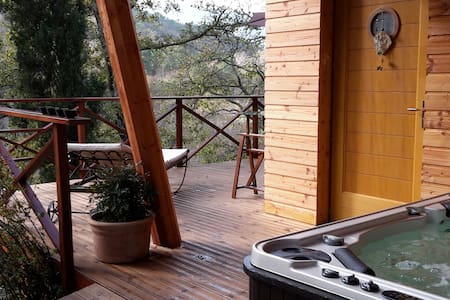 maison avec sauna et jacuzzi au bord de la rivière