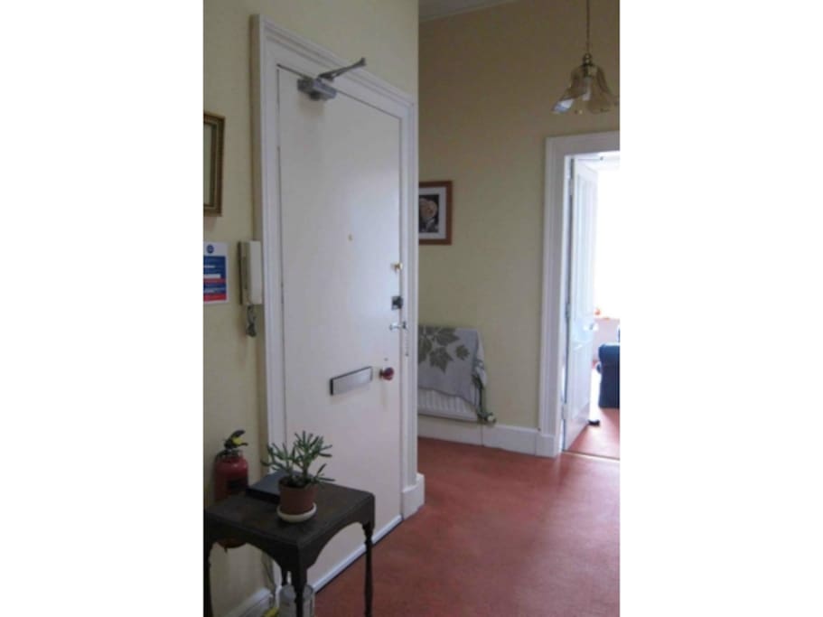 The hallway with secure front door / entry phone.