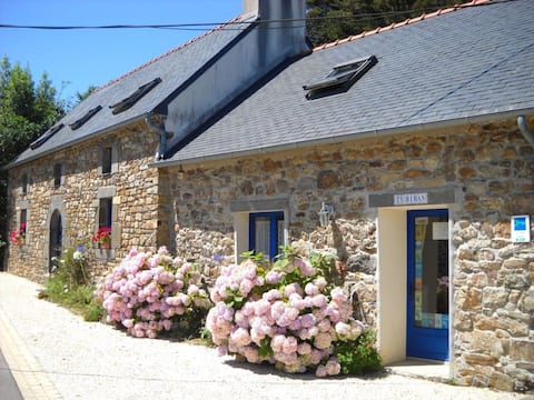 Old farmhouse with a view of the harbor.