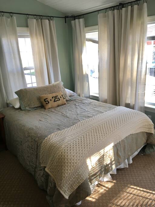 Queen sized bed. Empty dresser available for clothing. Box fan available for this room if needed.