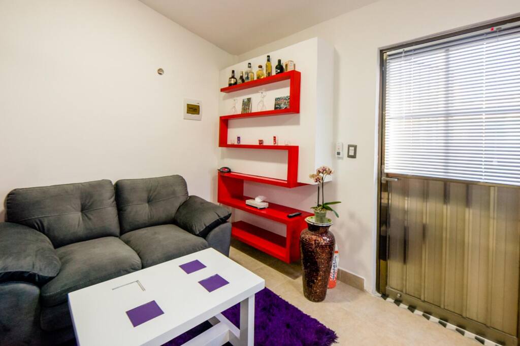 Couch and coffee table by the entrance
