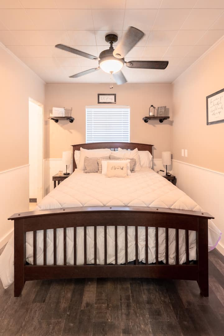 Enjoy a restful night in one of our cozy queen beds made just for the you! Included is a 32 inch TV mounted on wall for your entertainment. 