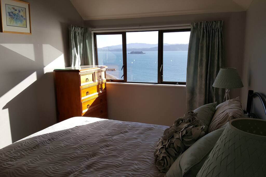 Enjoy the views and sound of the ocean from your bedroom